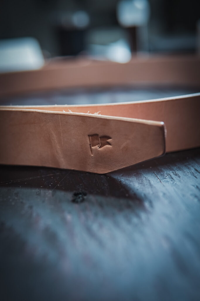 Natural vegetable tanned leather belt, stamped with a flag maker's mark by Black Flag Leather Goods