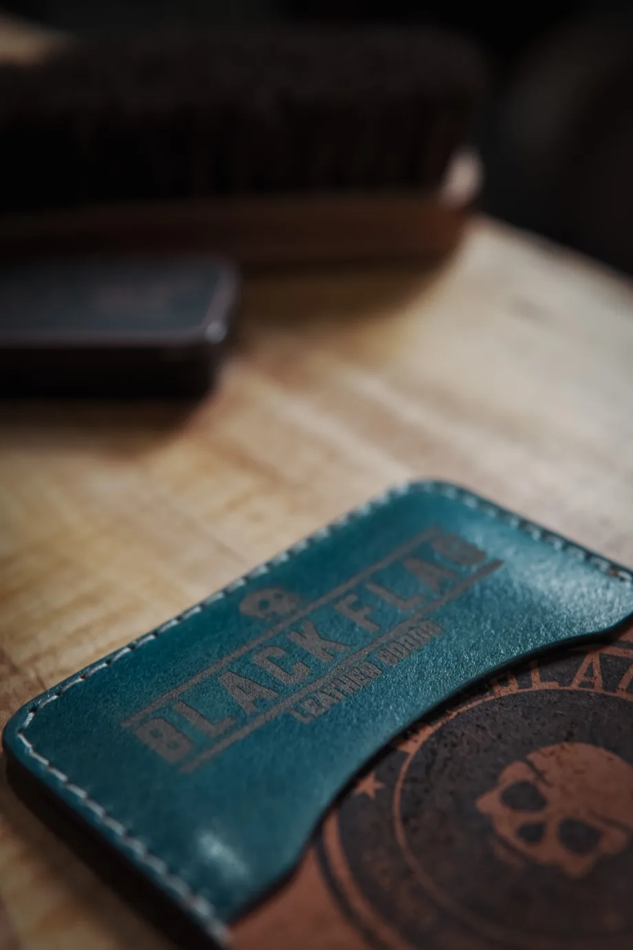 Close up of laser engraved minimalist bifold cardholder pocket