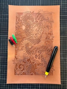 Leather tooling done by 21 Grams Leather Goods using The Leather Tattoo Machine 